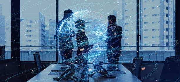 Silhouetted team in an office overlaid with a glowing data network